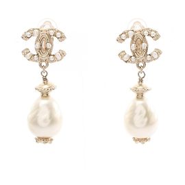 Pendientes Chanel A11C Swing Pearl Coco Mark Blanco Dorado