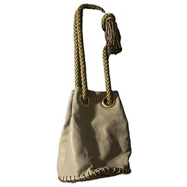 Delphine Delafon Sac seau en cuir beige et python Marron Beige