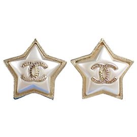 Orecchini Chanel Star dorati argento Argento