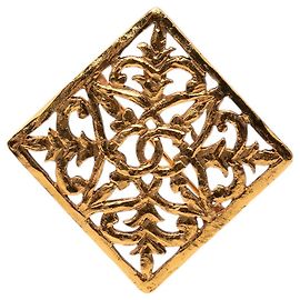 Broche Chanel Gold CC plaqué or avec filigrane de diamants Doré