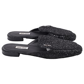 Mule glitterate in pelle nera Miu Miu Nero