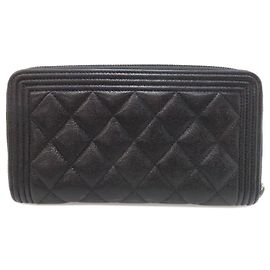 Cartera larga Boy de Chanel en piel de becerro negro Negro