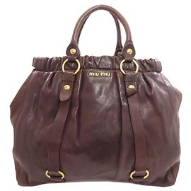 Borsa Tote Miu Miu in pelle di vitello con logo Marrone scuro