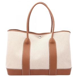 Hermès Bolsa Tote Hermes Neo Garden 41 Voyage Marrom Dourado Cru