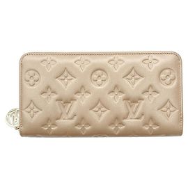 Cartera larga Monogram en oro rosa Louis Vuitton Dorado