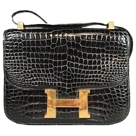 Hermès Constance en piel de cocodrilo negro Negro