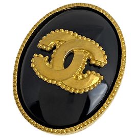 Broche Chanel Coco Mark Negro Dorado
