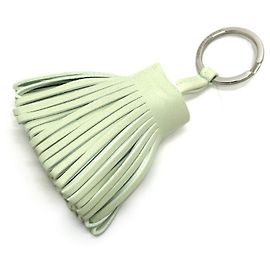 Chaveiro com franjas e tassel Carmen da Hermès Outro