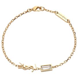 Bracciale Cassandra Yves Saint Laurent Oro e strass D'oro Metallico