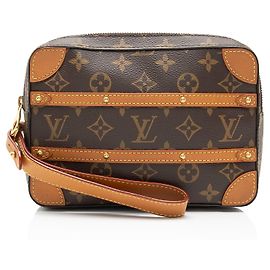 Pochette Soft Trunk en toile Monogram avec clous Louis Vuitton Marron