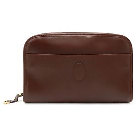 Clutch in pelle Must de Cartier Marrone