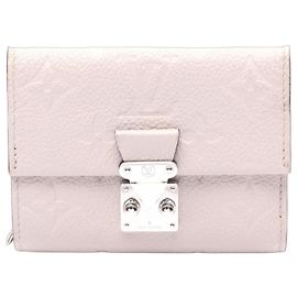 Portefeuille compact trois volets Metis Louis Vuitton Gris
