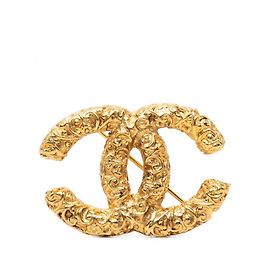 Spilla Chanel Coco Mark placcata oro D'oro