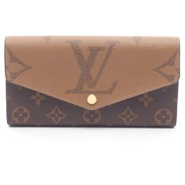 Portafoglio lungo Louis Vuitton Portefeuille Sarah Monogram Giant Reverse Marrone