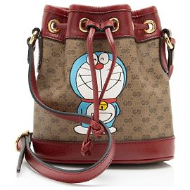 Mini bolsa bucket em canvas Micro GG Gucci x Doraemon Marrom