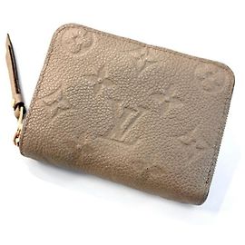 Monedero Zippy Monogram Empreinte Louis Vuitton Beige