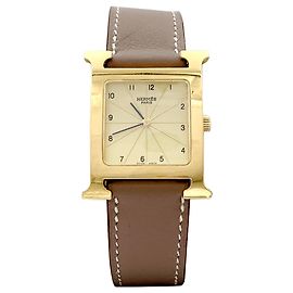 Montre Hermès, "Heure H", plaqué or, acier.  Autre