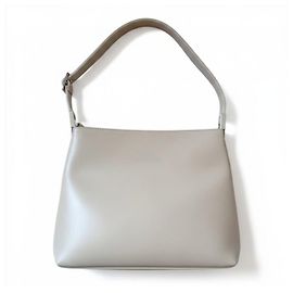 Autre Marque Lancaster Paris Bolsa de ombro em couro Bege