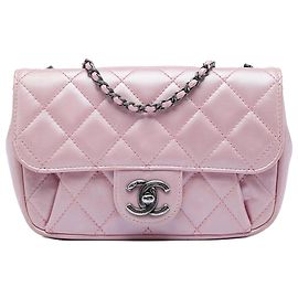 Chanel Mini Flap Coco Pleats em pele de vitelo metálica acolchoada rosa com corrente Rosa