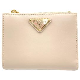 Portefeuille pliable avec logo triangle en cuir Prada Beige