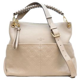 Borsa a tracolla Louis Vuitton Monogram Empreinte Tourtrelle Maida Hobo Beige