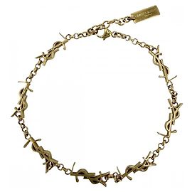 Bracelet à breloques doré Saint Laurent Doré