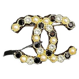 Chanel Spilla CC A20K Cristalli e Perle Nero Bianco D'oro Gold hardware