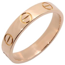Bague Mini Love de Cartier en or rose 18K Doré