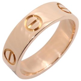 Bague Love de Cartier en or rose 18K Doré