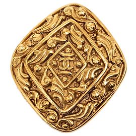 Spilla Chanel Coco Mark Arabesque D'oro