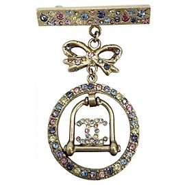 Broche Chanel banhada a ouro com strass Multicor Dourado