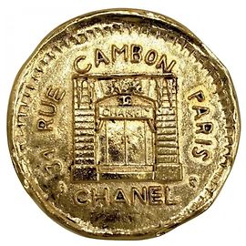 Spilla Chanel Vintage placcata oro D'oro