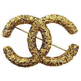 Spilla Chanel placcata oro D'oro
