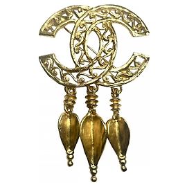 Spilla Chanel Vintage placcata oro D'oro