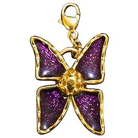 Yves Saint Laurent Pingente de borboleta em metal dourado e esmalte roxo Dourado Roxo