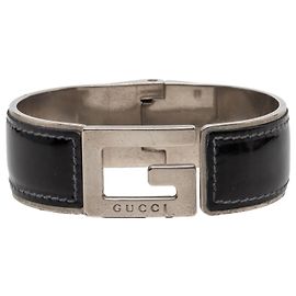 Bracciale G Cuff in pelle nera e ottone Gucci Nero