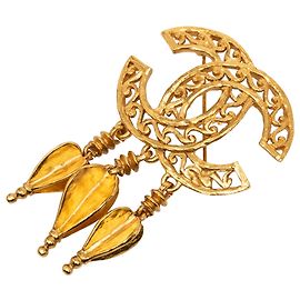 Broche Chanel Gold CC en filigrane doré avec franges Doré