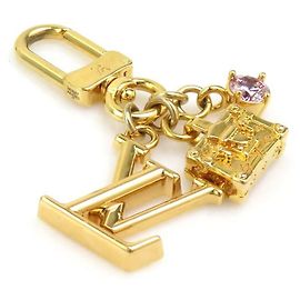 Chaveiro Micro Charm Louis Vuitton Dourado