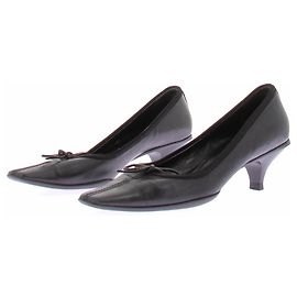 Prada Tacchi neri con fiocchi Nero