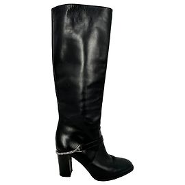 Yves Saint Laurent Botas de cano alto Saint Laurent com detalhe de corrente em couro preto Outro Impressão em python
