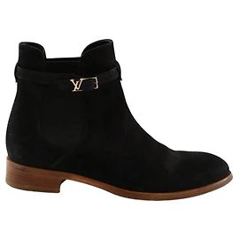 Botas Louis Vuitton de pele preta com fivela Preto