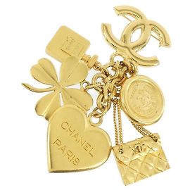Broche Chanel dourado Dourado