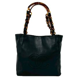 Bolsa Chanel Coco Mark em couro de cordeiro Marrom Preto