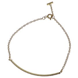 Bracciale charm Tiffany & Co. Diamond T Smile Altro