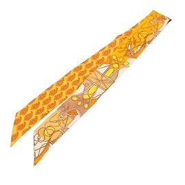 Sciarpa Twilly in seta Hermès Yellow Coup de Fouet au Bloc Giallo