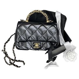 Chanel Mini borsa con patta e manico nera e oro Nero