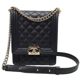 Borsa Chanel serie Boy in caviar nero e oro champagne Nero