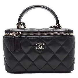 Chanel Bolsa vanity de couro de cordeiro com alça de mão e transversal Preto