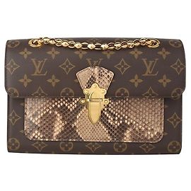 Louis Vuitton Bolsa transversal Victorine em python monogramado com corrente dourada Multicor