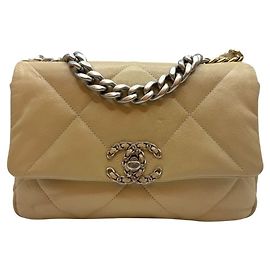 Chanel Piccola borsa a tracolla in agnello beige Marrone